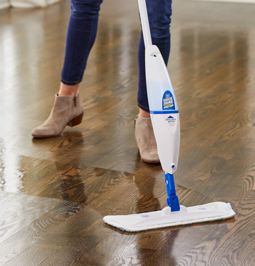 Women wearing jeans and boots cleaning floor with Quick Shine® Multi-Surface Spray Mop